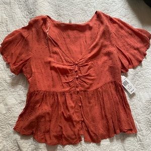 Planet gold coral top in size XL